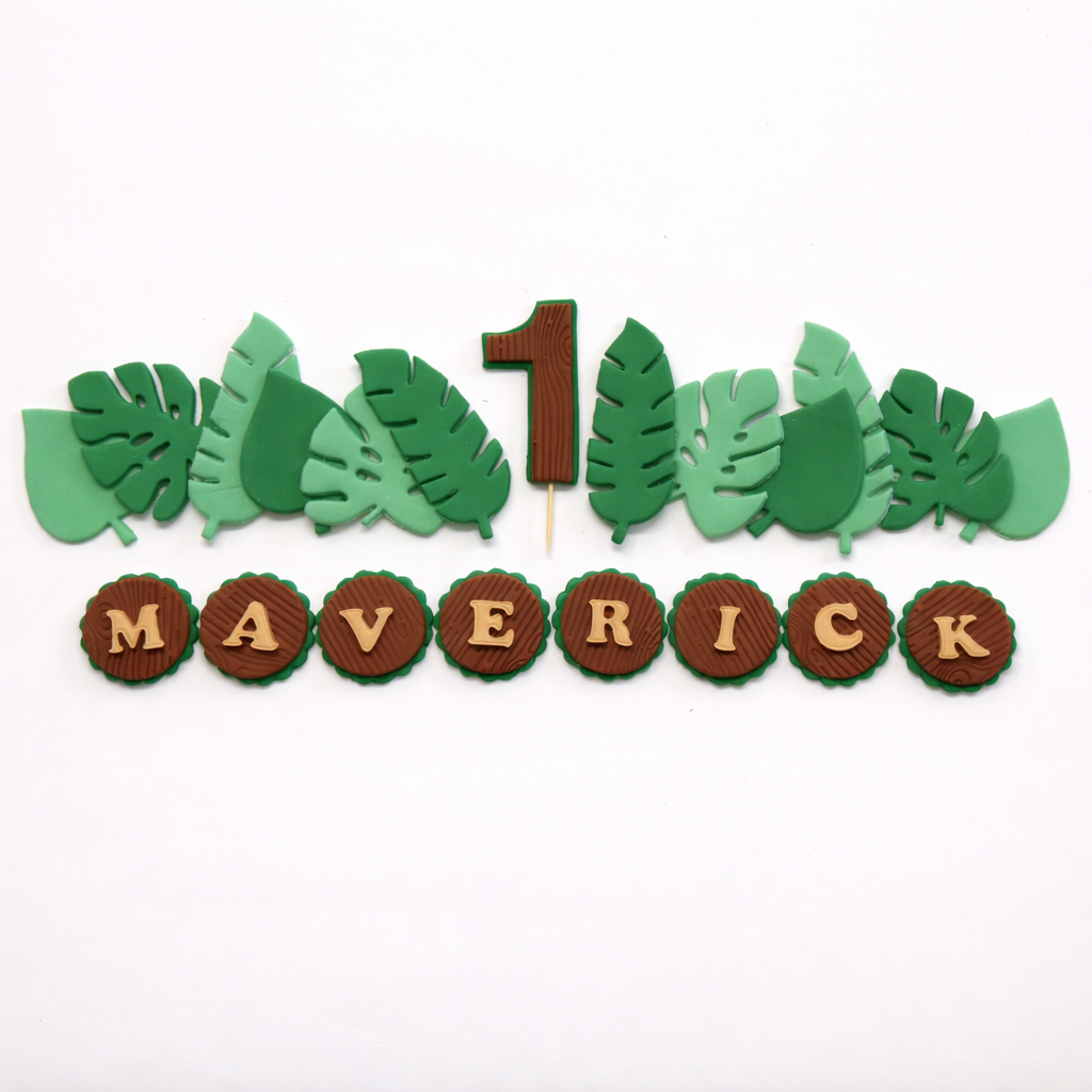 Fondant cake topper set including personalised number name and jungle leaves 