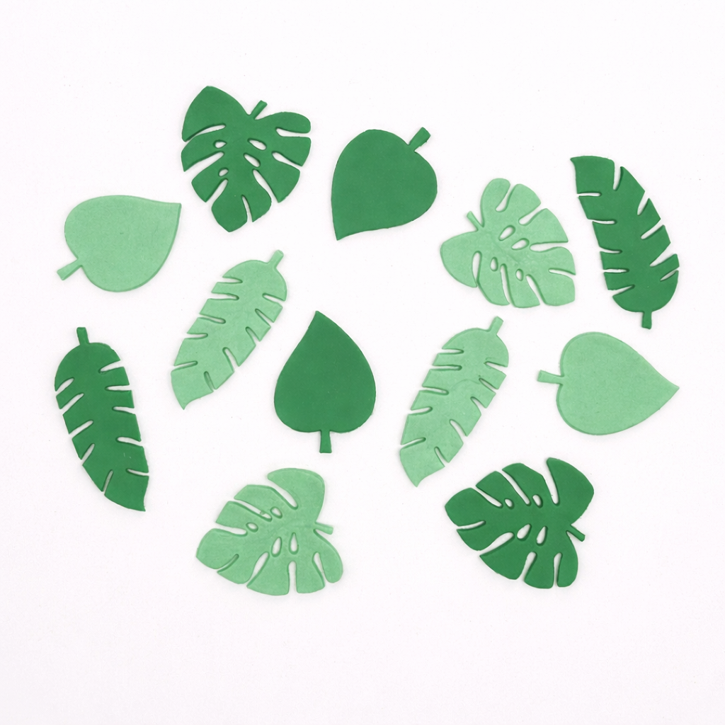 Collection of green fondant leafs on a white background